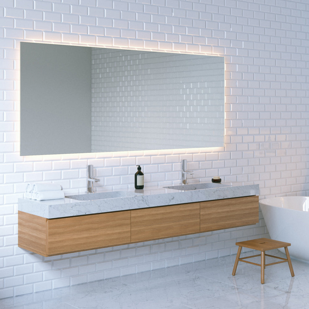 https://www.armacostlighting.com/cdn/shop/files/Cool-White-LED-Strip-Light-Tape-Bathroom.jpg?v=1660670258
